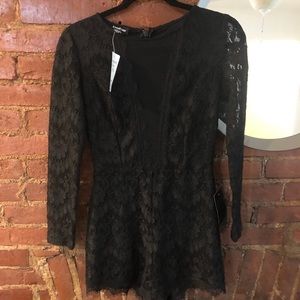 Bebe lace romper. Black with mesh paneling